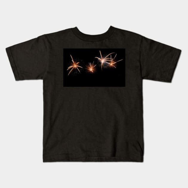 Four white sparkly fireworks Kids T-Shirt by Woodys Designs